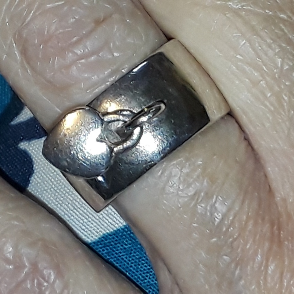 925 SS ring size 6 with dangling heart charm
